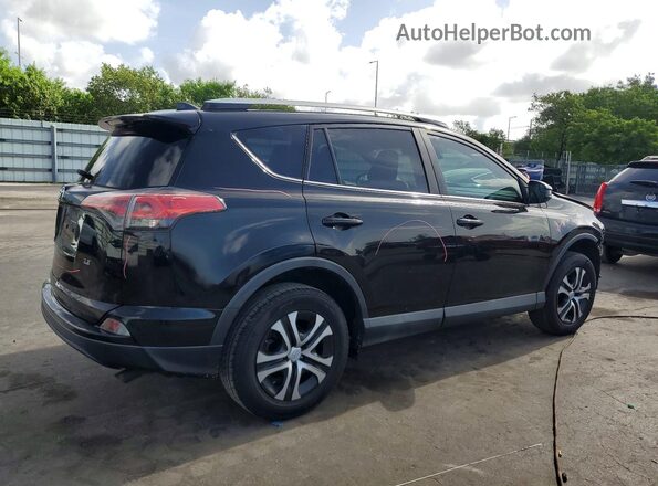 2T3ZFREV5HW321120 2017 TOYOTA RAV4 Black Задня права чверть