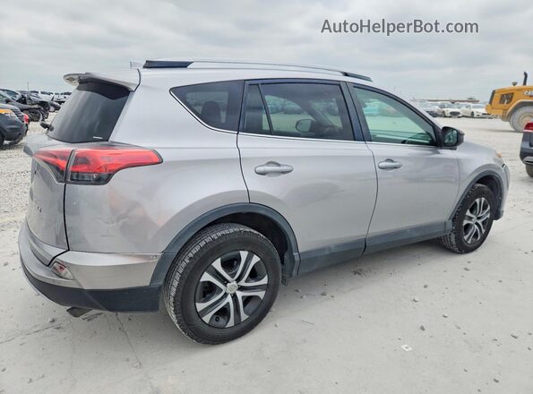 2T3ZFREV5HW325118 2017 TOYOTA RAV4 Silver Հետևի աջ