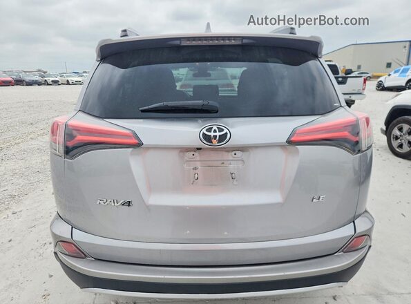 2T3ZFREV5HW325118 2017 TOYOTA RAV4 Silver Հետևի տեսք