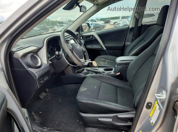 2T3ZFREV5HW326768 2017 TOYOTA RAV4 Silver Vista interior delantera