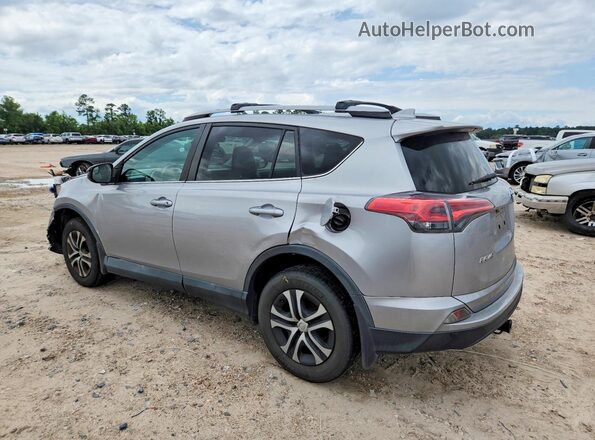 2T3ZFREV5HW326768 2017 TOYOTA RAV4 Silver Trasero izquierdo