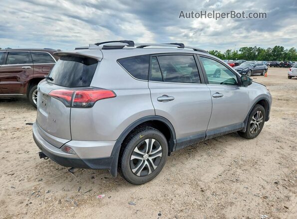 2T3ZFREV5HW326768 2017 TOYOTA RAV4 Silver Trasero derecho