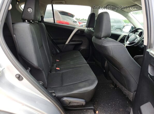 2T3ZFREV5HW326768 2017 TOYOTA RAV4 Silver Vista de los asientos traseros