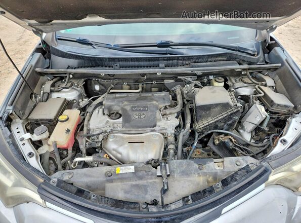 2T3ZFREV5HW326768 2017 TOYOTA RAV4 Silver Vista interior trasera