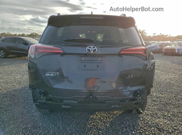 2T3ZFREV6HW367183 2017 TOYOTA RAV4 Серый Вид сзади