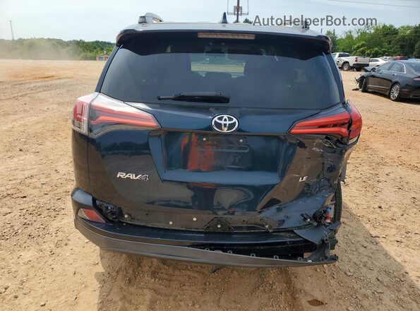 2T3ZFREV6JW463031 2018 TOYOTA RAV4 Blue Rear view