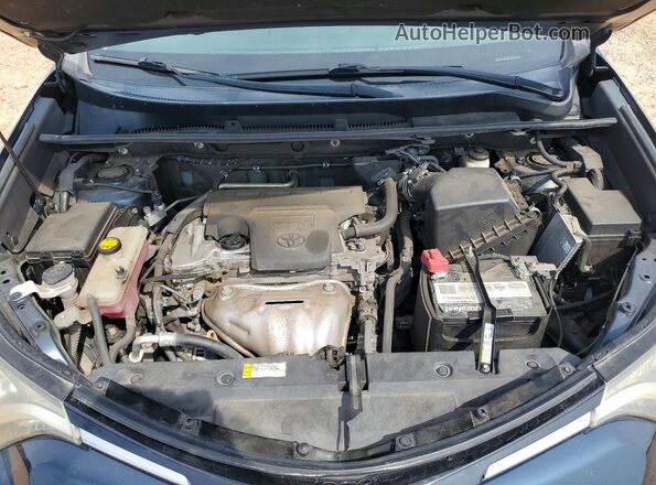2T3ZFREV6JW463031 2018 TOYOTA RAV4 Blue Engine compartment view