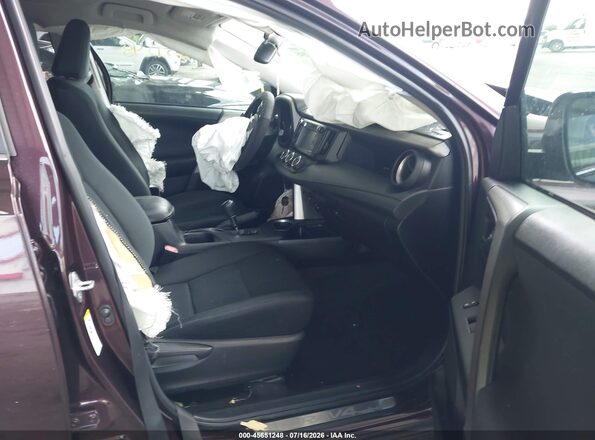 2T3ZFREV6JW514608 2018 TOYOTA RAV4 Purple Widok wnętrza z przodu