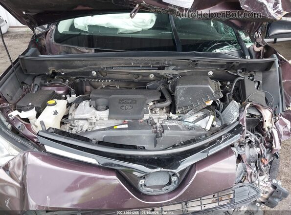 2T3ZFREV6JW514608 2018 TOYOTA RAV4 Purple Widok z tyłu