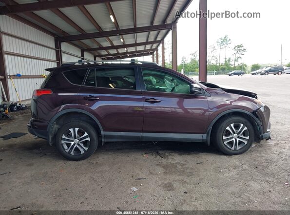 2T3ZFREV6JW514608 2018 TOYOTA RAV4 Purple Widok wnętrza z tyłu