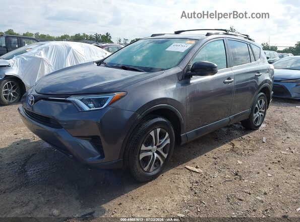 2T3ZFREV7GW247648 2016 TOYOTA RAV4 Gray წინა მარცხენა ხედი სამი მეოთხედიდან