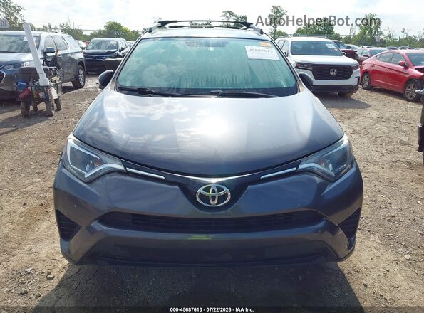 2T3ZFREV7GW247648 2016 TOYOTA RAV4 Gray წინა ხედი