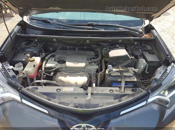 2T3ZFREV7GW247648 2016 TOYOTA RAV4 Gray უკანა ხედი