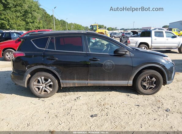 2T3ZFREV7JW435271 2018 TOYOTA RAV4 Black Widok wnętrza z tyłu