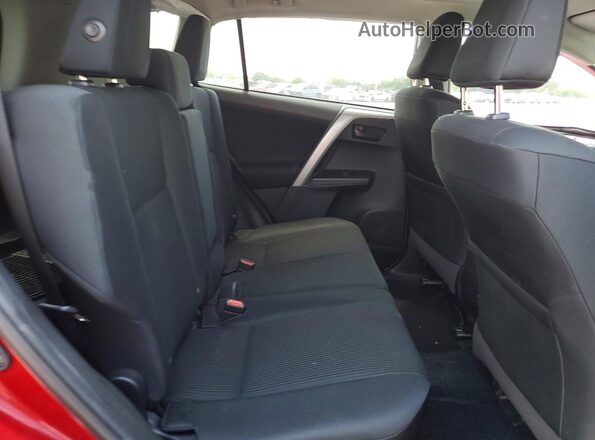 2T3ZFREV7JW516643 2018 TOYOTA RAV4 Red Vista interior trasera