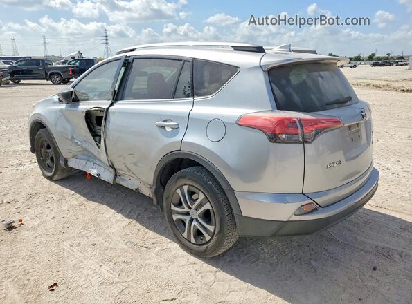 2T3ZFREV8HW342110 2017 TOYOTA RAV4 Silver უკანა მარცხენა