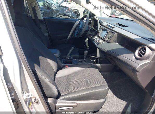 2T3ZFREV8JW418365 2018 TOYOTA RAV4 Silver Vista interior delantera