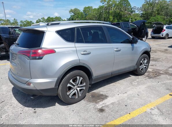 2T3ZFREV8JW418365 2018 TOYOTA RAV4 Silver Trasero derecho
