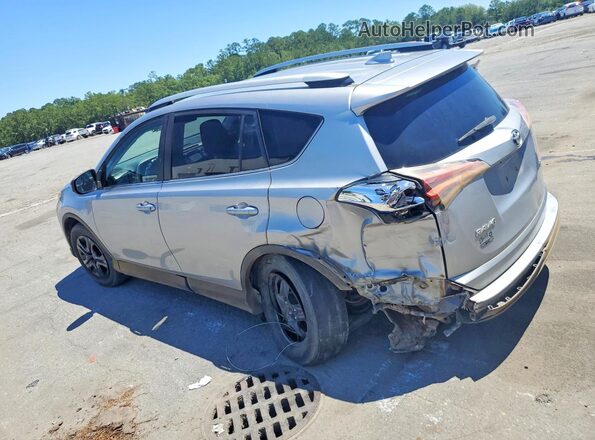 2T3ZFREV9GW272633 2016 TOYOTA RAV4 Серебряный Задняя левая четверть