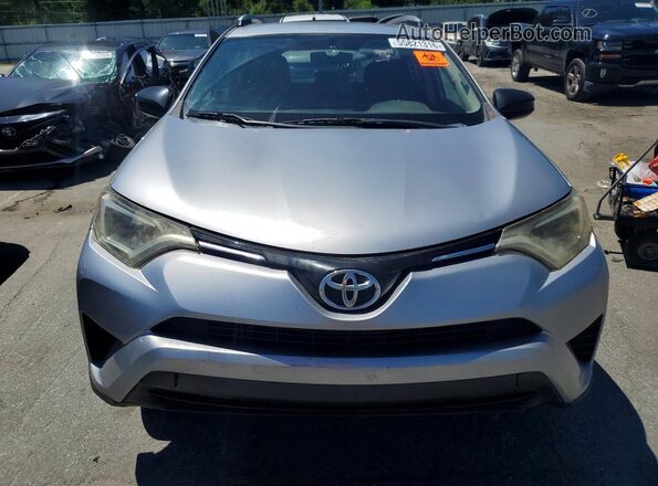 2T3ZFREV9GW272633 2016 TOYOTA RAV4 Серебряный Вид спереди