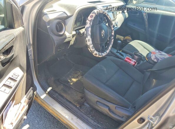 2T3ZFREV9GW272633 2016 TOYOTA RAV4 Серебряный Вид панели приборов