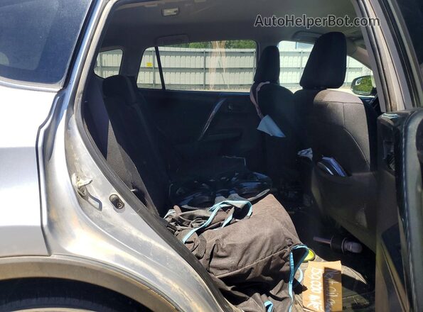2T3ZFREV9GW272633 2016 TOYOTA RAV4 Серебряный Вид задней части салона