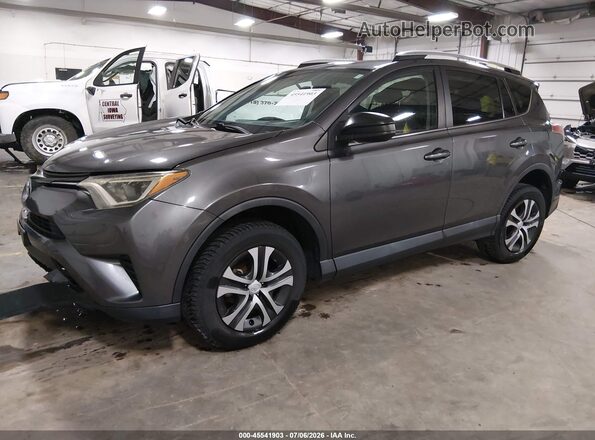 2T3ZFREV9GW284393 2016 TOYOTA RAV4 Gray Առջևի ձախ երեք քառորդ տեսարան