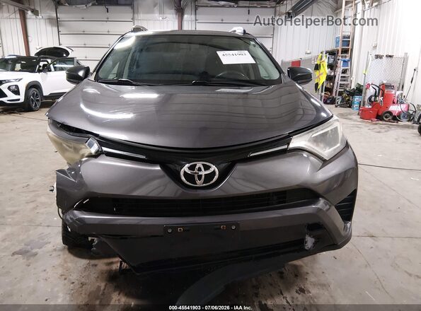 2T3ZFREV9GW284393 2016 TOYOTA RAV4 Gray 