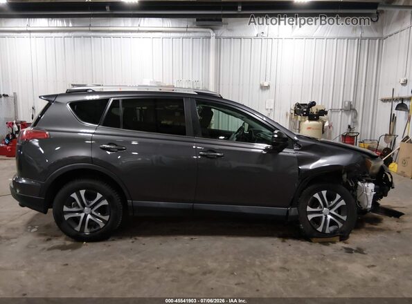 2T3ZFREV9GW284393 2016 TOYOTA RAV4 Gray Սալոնի հետևի տեսք