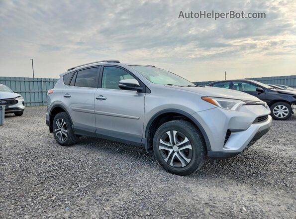 2T3ZFREV9HW393194 2017 TOYOTA RAV4 Silver Delantero derecho
