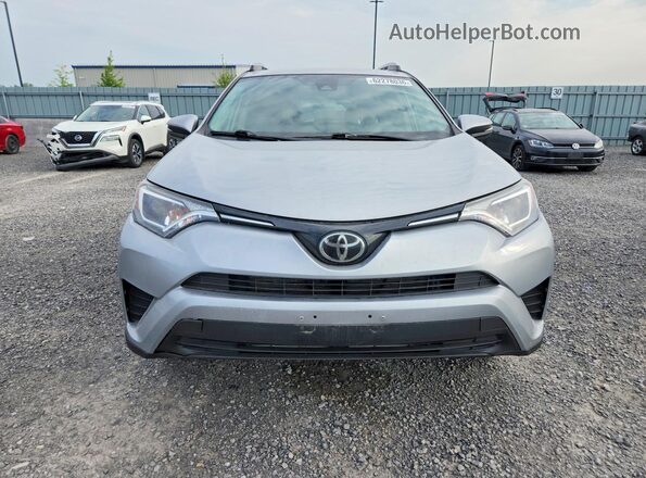 2T3ZFREV9HW393194 2017 TOYOTA RAV4 Silver Vista frontal
