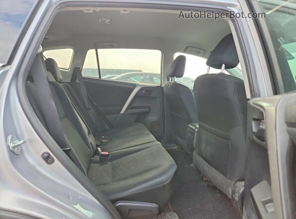 2T3ZFREV9HW393194 2017 TOYOTA RAV4 Silver Vista interior trasera