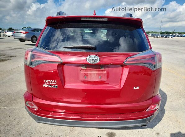 2T3ZFREV9JW489221 2018 TOYOTA RAV4 Red Vista trasera