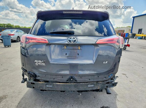 2T3ZFREV9JW511170 2018 TOYOTA RAV4 Gray Widok z tyłu