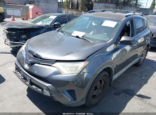 2T3ZFREVXGW306871 2016 TOYOTA RAV4 Gray Передня ліва чверть