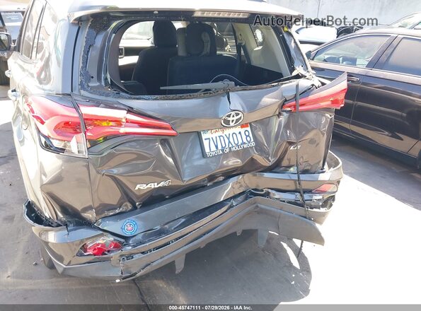 2T3ZFREVXGW306871 2016 TOYOTA RAV4 Gray Вид спереду