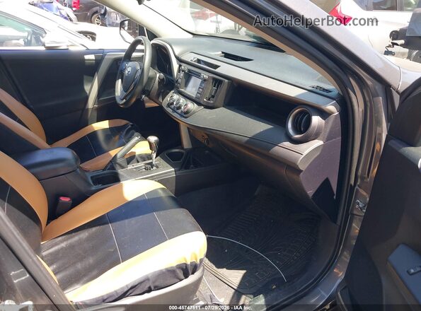 2T3ZFREVXGW306871 2016 TOYOTA RAV4 Gray Вид салону спереду