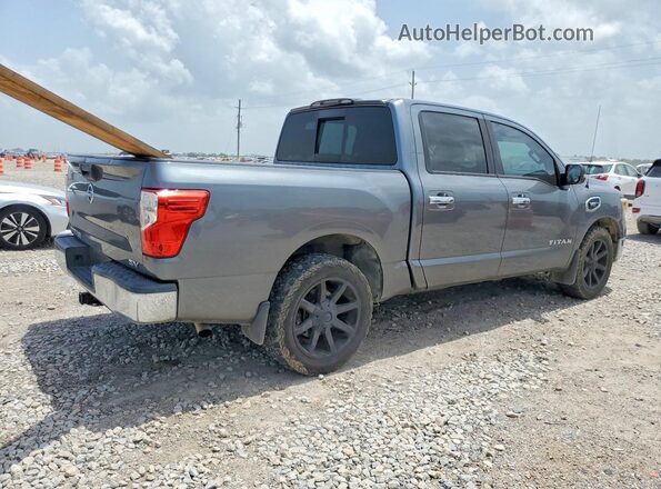 1N6AA1EK3HN512770 2017 NISSAN TITAN Серый Передняя правая четверть