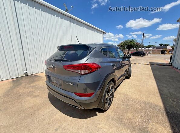 KM8J33A27GU111902 2016 HYUNDAI TUCSON Gray Widok z przodu