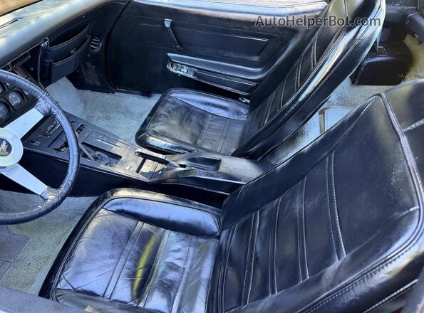 1Z37L7S410519 1977 CHEVROLET CORVETTE Оранжевый Вид салона спереди