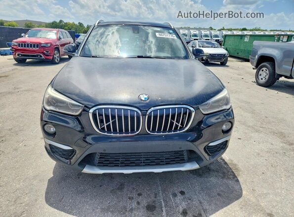 WBXHT3Z37H4A53653 2017 BMW X1 Black Вид ззаду