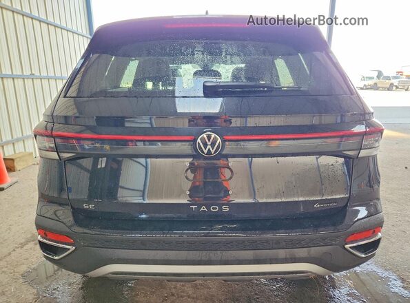3VVUC7B24TM043615 2026 VOLKSWAGEN TAOS Black Widok wnętrza z przodu