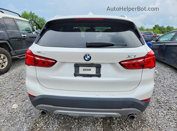 WBXHU7C31J5H42519 2018 BMW X1 White Vista interior delantera