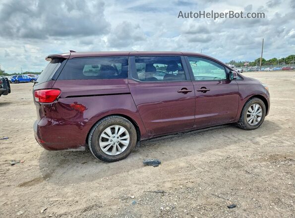 KNDMB5C16H6241163 2017 KIA SEDONA Maroon Front right