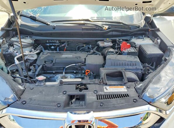2HKRW6H33JH225671 2018 HONDA CR-V White Вид наклейки з VIN-кодом