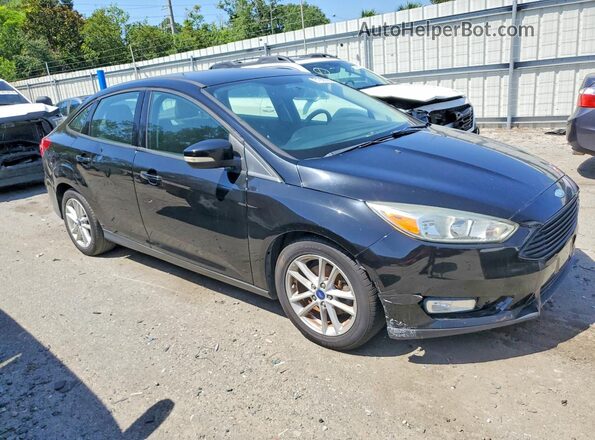 1FADP3F2XHL223833 2017 FORD FOCUS Black Front view