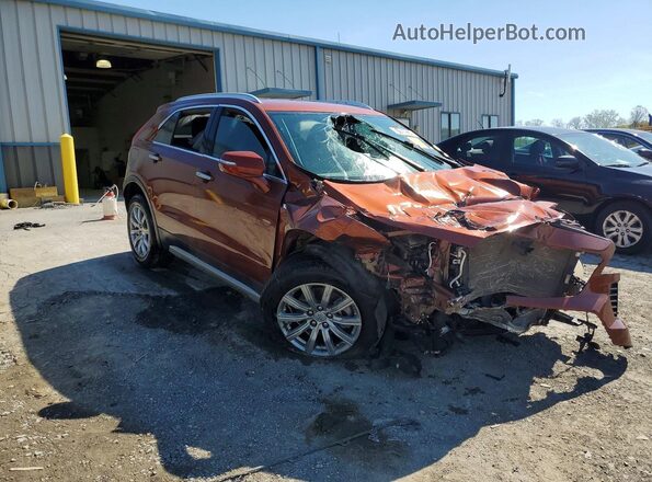1GYFZDR45MF003793 2021 CADILLAC XT4 Orange Front view