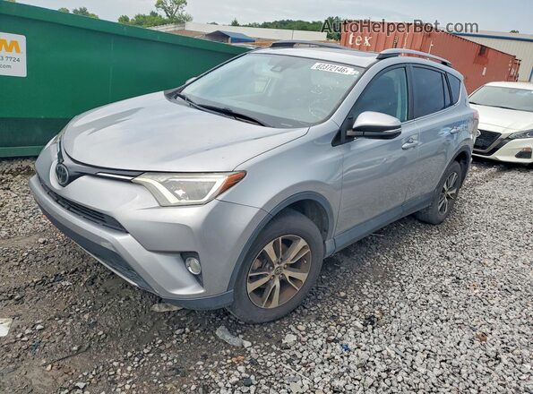 2T3WFREV6JW501876 2018 TOYOTA RAV4 Silver Tył lewy