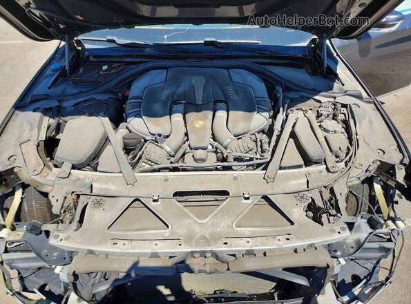 WBA7F2C53GG420172 2016 BMW 7 SERIES Gray Vista del compartimento del motor