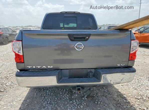1N6AA1EK3HN512770 2017 NISSAN TITAN Серый Вид салона спереди